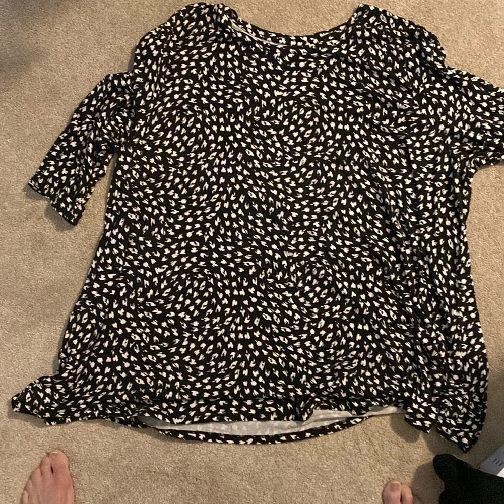 Black and cream colored print blouse